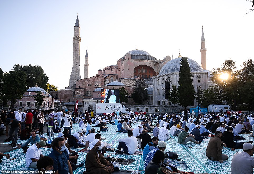 ISTANBUL, TURKEY: Muslims pray outside the Hagia Sophia, which was recently converted back into a mosque in a controversial move signed off by Turkey's president Recep Tayyip Erdogan
