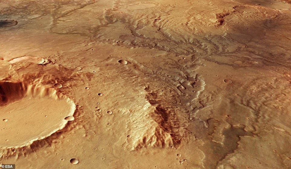 Stunning images captured by the European Space Agency’s Mars Express Satellite have revealed a glimpse into the red planet’s warm, watery past. The perspective view above illustrates an ancient river valley network on Mars