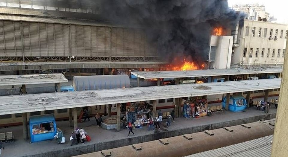 Part of the station's main building collapsed after being consumed by flames, according to local media which described panicked scenes as people fled