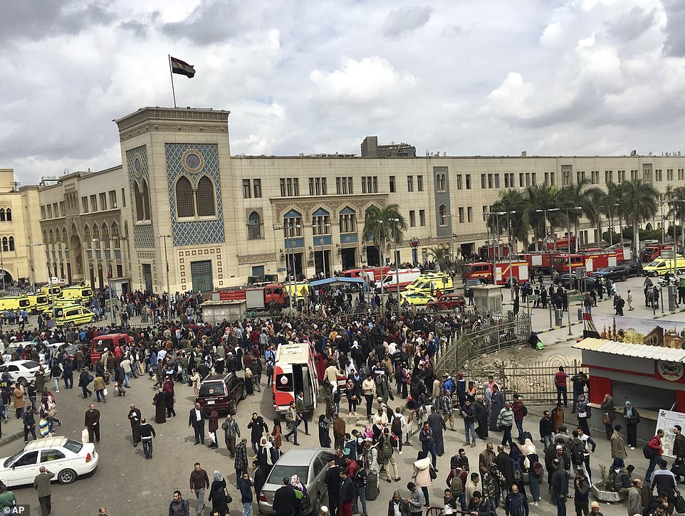 Emergency vehicles surround Ramses station in central Cairo as crowds gather on Wednesday