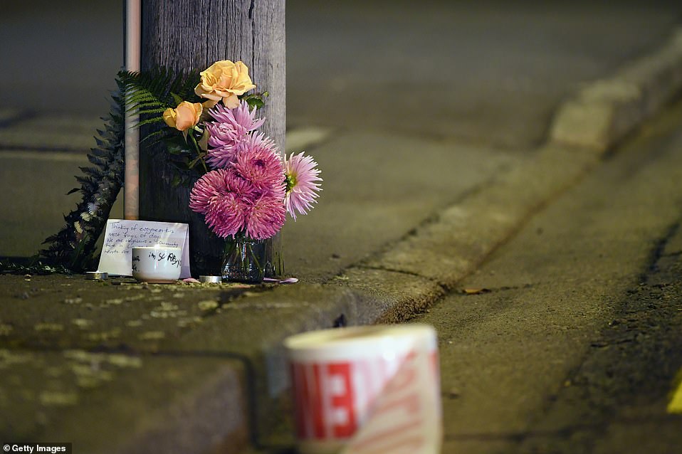 A floral tribute to the victims of the Christchurch massacres is seen on the same avenue as the second mosque