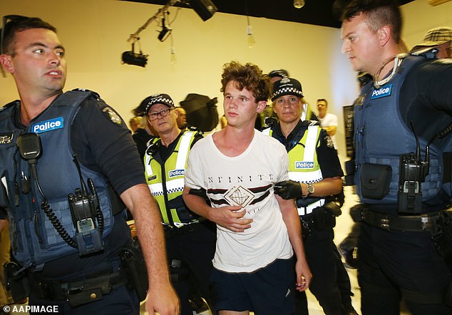 The young man was removed from the event by Victoria Police (pictured)