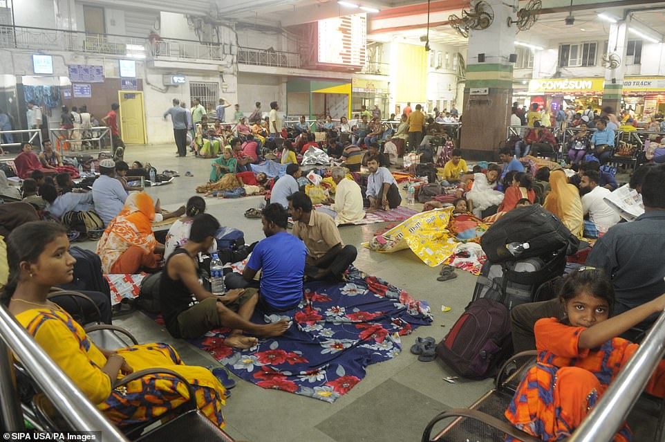 Passengers are stranded as trains are cancelled due to the onset of cyclone Fani, at Howrah Railway Station on May 3, 2019 in Kolkata, India. Cyclone Fani tore through India's eastern coast on Friday as a grade 5 storm, lashing beaches with rain and winds gusting up to 205 kilometers per hour and affecting weather as far away as Mount Everest as it approached the West Bengal capital Kolkata