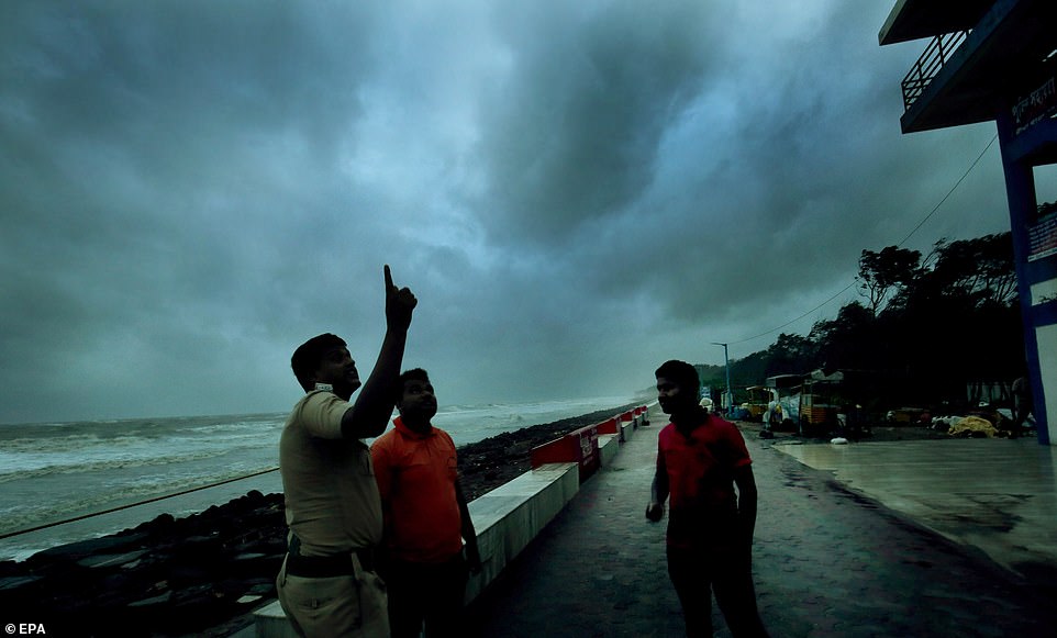 Disaster Managment Group officials on the deserted banks of the Bay Of Bengal as tourists being evacuted before Cyclone Fani made landfall at neighbouring West Midnapore of West Bengal some 200 km west of Kolkata, eastern India, on Friday