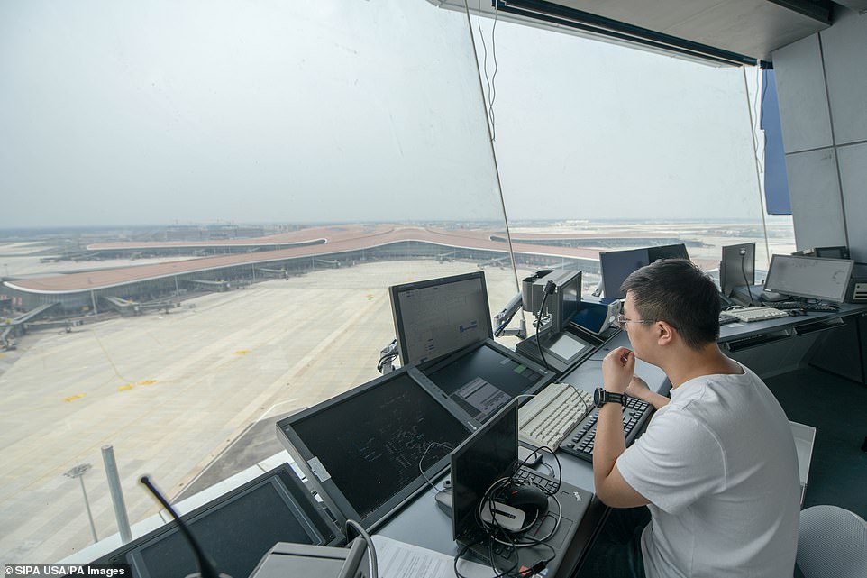 A 1,345-square-foot command centre perches at the top of the control tower which will be responsible for handling at least 70 per cent of the airport's traffic. With seven runways in plan, the hub occupies a piece of land four-fifth the size of Manhattan