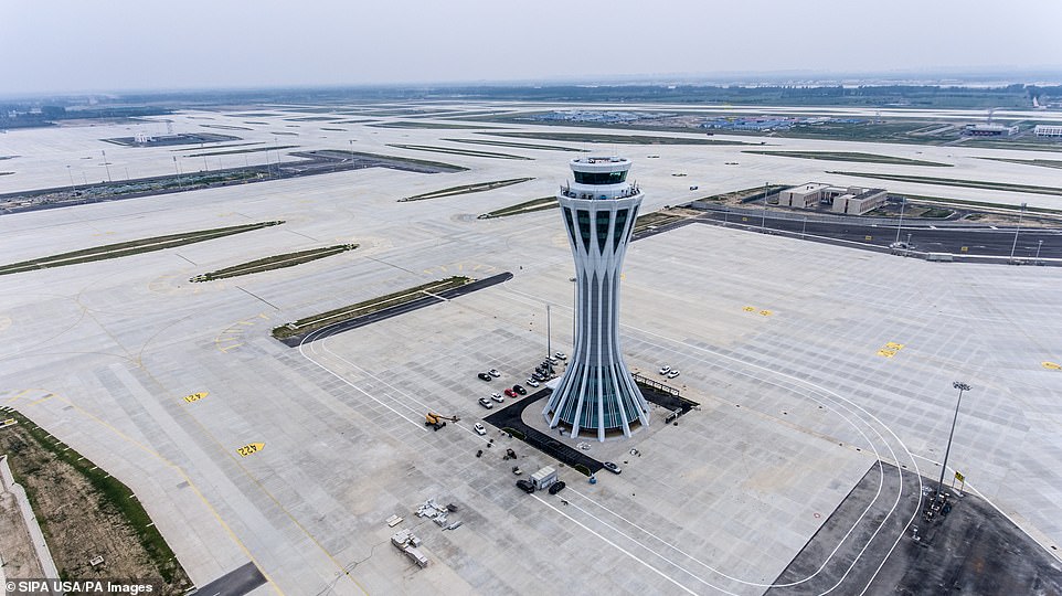 Last week, authorities unveiled the hub's main air traffic control tower. The 20-storey structure, designed to resemble the shape of a feather from a phoenix, took workers two years to build
