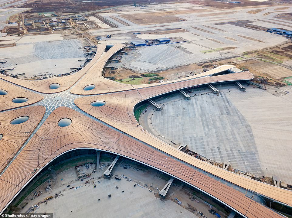 The terminal building, resembling a massive shining starfish, was designed by late British-Iraqi architect Zaha Hadid