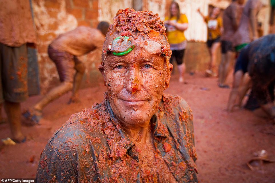 This man appeared completely at peace during the festival, despite having what looked like a pile of tomato pulp on top of his head and almost every inch of his face covered