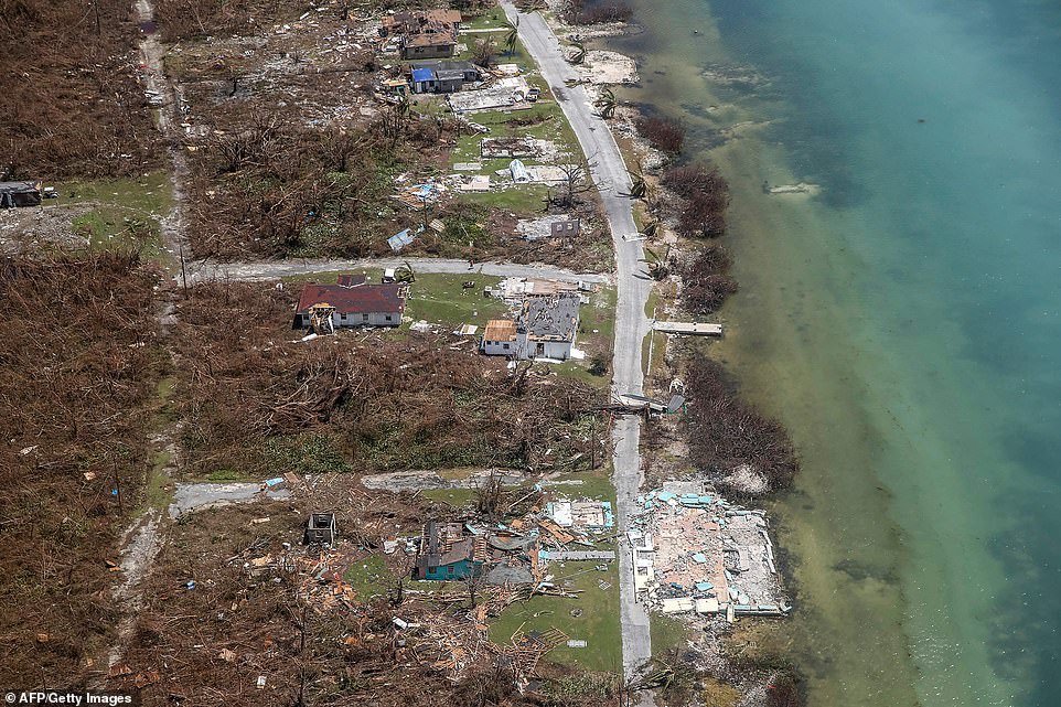 Pictured above is the damage done to the Grand Bahama. Rubble can be seen left strewn as the roofs from houses on the floor