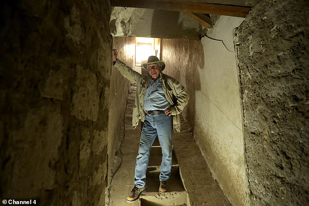 The American archaeologist pictured inside the black pyramid. It contained three chambers, for the Pharaoh and his two wives, it was also raided.