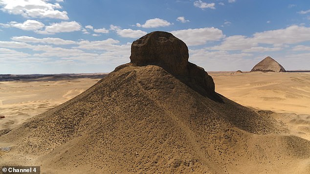 She was buried around a mile from the tomb of her father Ameny Qemau, who is buried in the black pyramid (pictured)