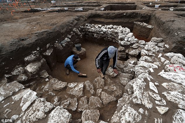 Israeli archaeologists have unveiled the remains of a 5,000-year-old city they say is among the biggest from in its era in the Middle East that includes a ritual temple with rare figurines and burnt animal bones