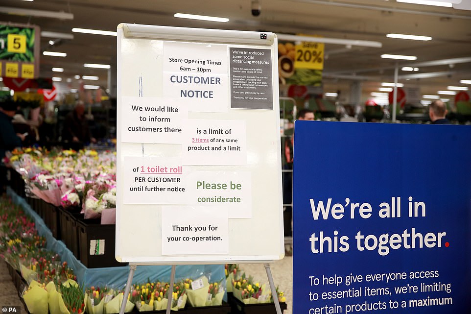 A sign for customers on entering Tescos in Aldershot telling them there is a limit of three items of any same product and a limit of one toilet roll per customer