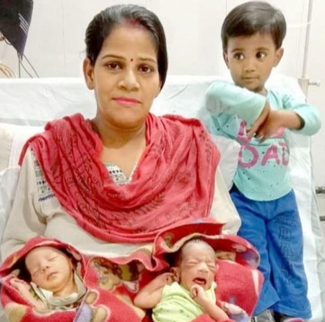 Preeti Verma gave birth to son Corona and daughter Covid on March 27 amid India's 21-day lockdown, according to reports from Indian News Outlet NDTV. She is pictured above with her newborn children and two year old daughter