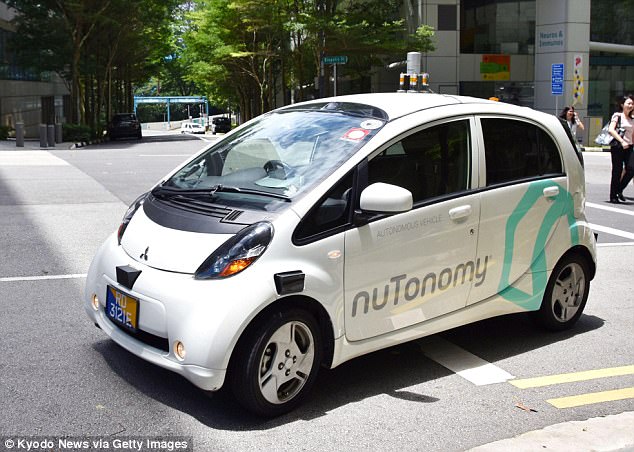 Around ten local and foreign companies are currently in Singapore to test their driverless vehicle technology. An autonomous taxi turns at an intersection during a test drive in Singapore in 2016
