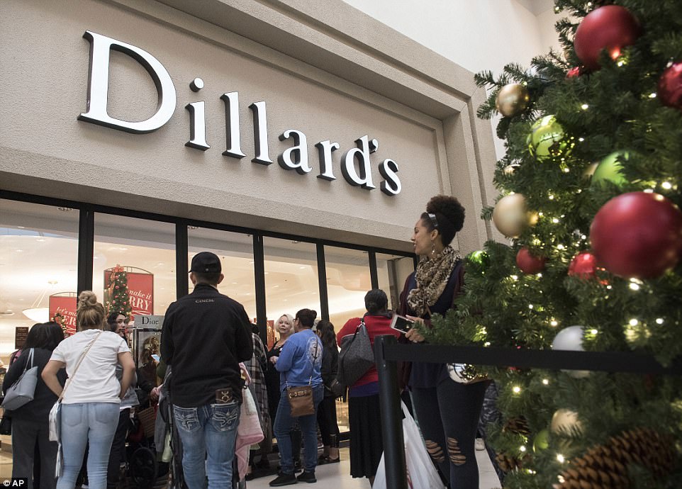TEXAS: Shoppers wait for Dillards to open at 8am in Tyler, Texas, on Friday 