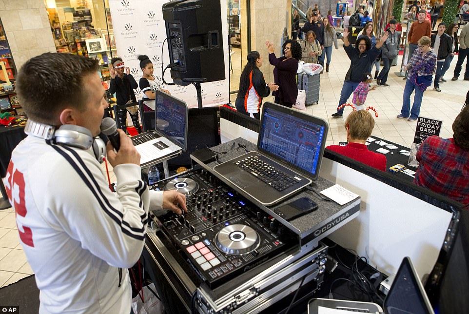 VIRGINIA: At Valley View Mall in Roanoke, Virginia, DJ Russell Prusak entertained shoppers in one of the mall's ploys to keep people coming in rather than shop online 