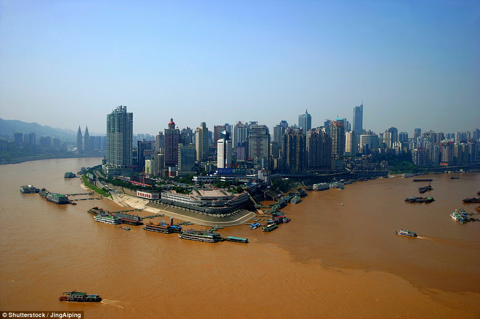 The iconic Yangtze River and Jialing River meet at the scenic Chaotianmen area, pictured before the construction started