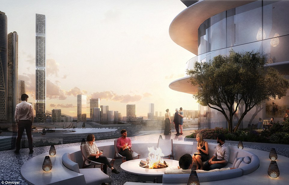 The hotel is set to include plenty of outdoor space for guests to relax in. The rendering above shows a lounge area, complete with circular seating and a fire pit