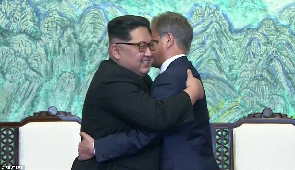 Kim Jong-un and his South Korean counterpart Moon Jae-in have embraced warmly after signing a statement in which they declared 'there will be no more war on the Korean Peninsula'