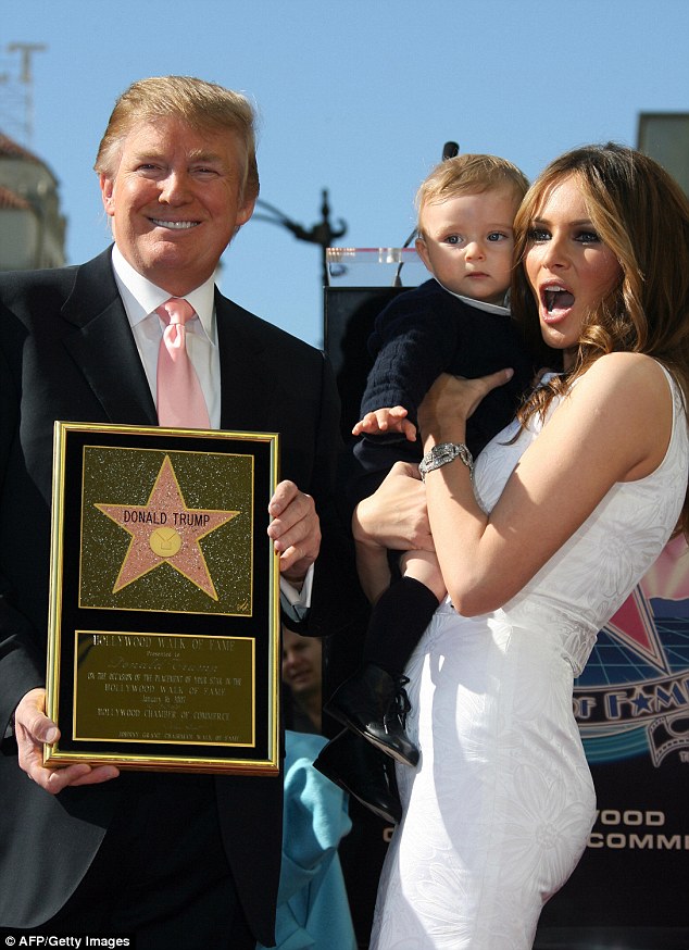 Donald Trump (left) is seen here with wife Melania Trump and their then-10-month-old son Barron after Trump was honored with the 2,327th star on the Hollywood Walk of Fame on Hollywood Boulevard in Hollywood, California on January 16, 2007