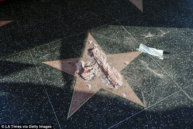 The damage that resulted from the last time Trump's star was demolished with a pick axe, and a sledge hammer, in October 2016 is shown here