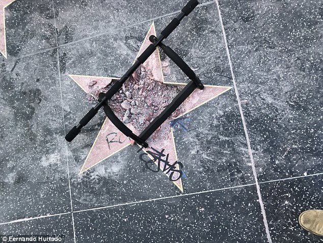 Some time after the incident, a pull up bar was placed over the debris in the spot where Trump's star used to sit, presumably to protect passersby from tripping over the rubble.
