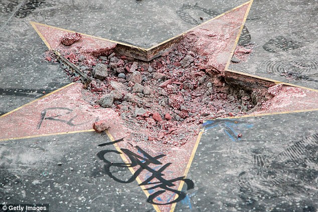 Police say a white male who is approximately 25 years old is in custody, related to the early-morning destruction of Donald Trump's star on the Hollywood Walk of Fame on Wednesday
