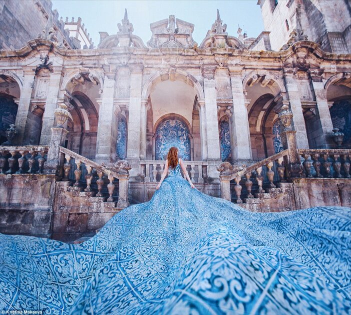 The blue-and-white patterned skirt of this flowing gown match the tiles on this historic building in Porto, Portugal