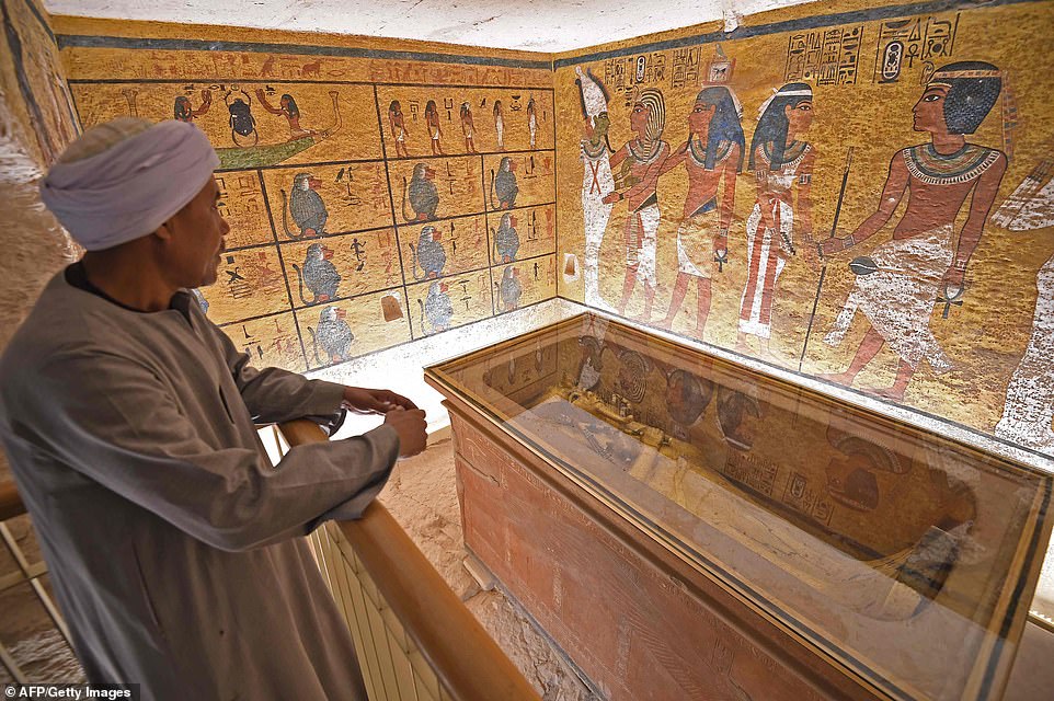 Researchers painstakingly cleaned the huge wall art in the tomb - but decided to leave a series of strange mysterious 'dark spots' that were there in 1922 when archaeologist Howard Carter first opened the tomb