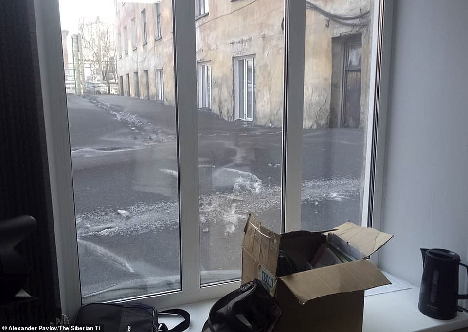 A resident ofÂ Prokopyevsk city posted this image in social media showing the black snow-covered street outside the window