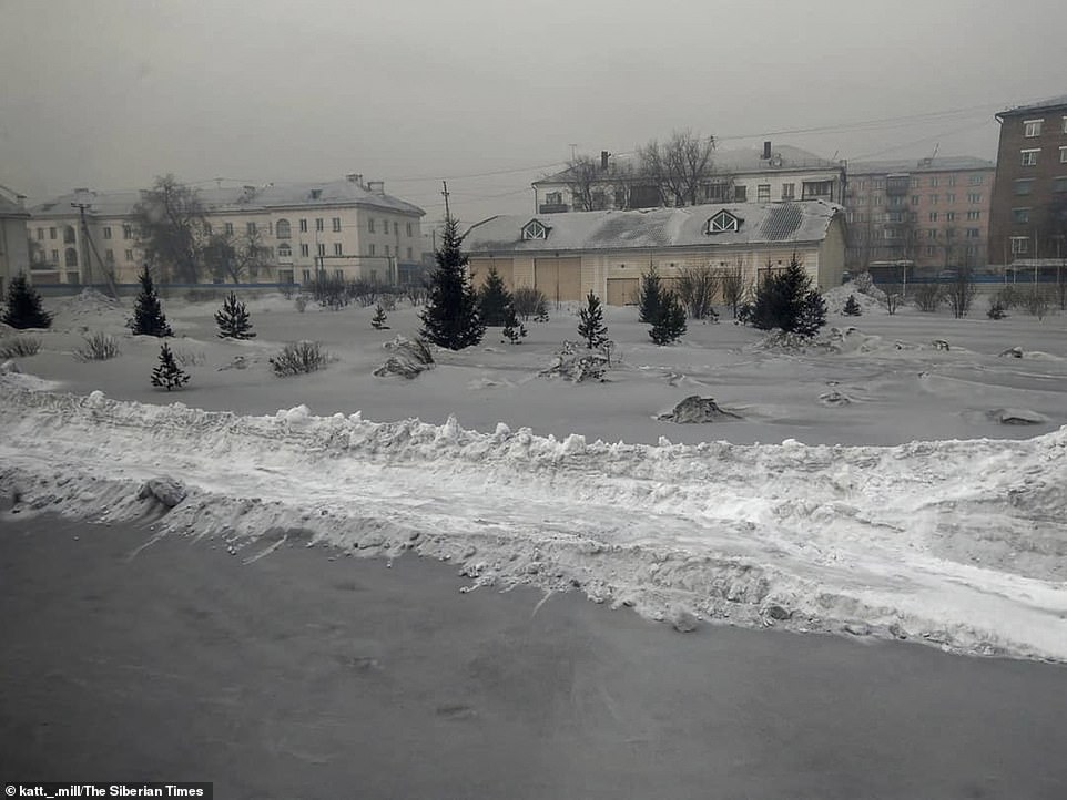 Streets and fields inÂ Prokopyevsk were covered in grey and black snow after the pollution tarnished theÂ Kemerovo region