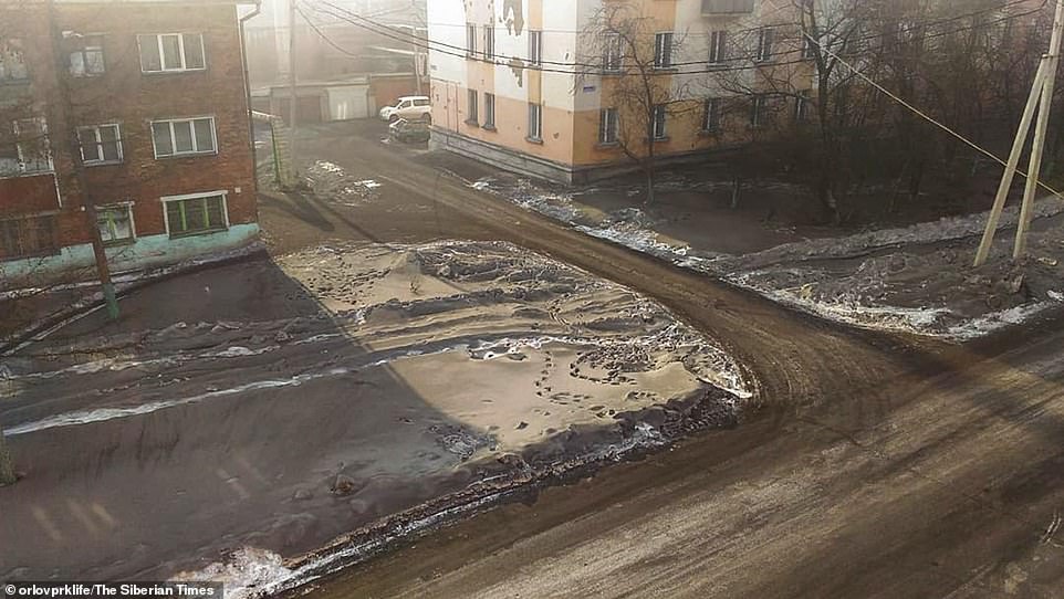 Prokopyevsk (pictured) Leninsk-Kuznetsky and Kiselyovsk cities have all seen the black snow covering the streets and buildingsÂ 