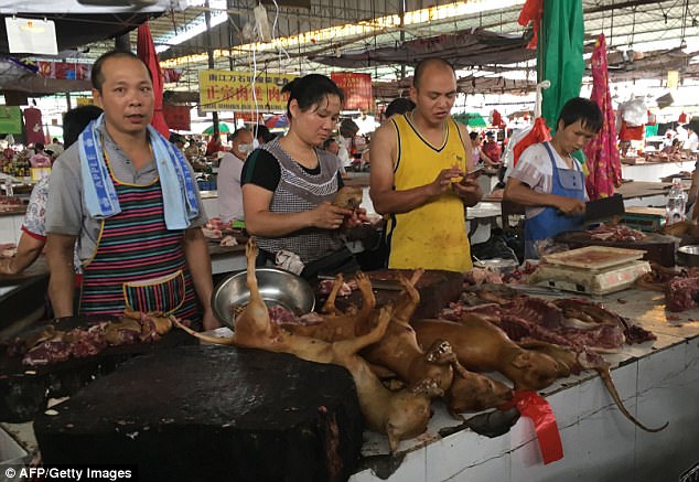 Multiple carcasses rested on a stall at the main Nanqiao market on June 21 as the Yulin Dog Meat Festival begins. The locals eat dog meat to celebrate the summer solstice