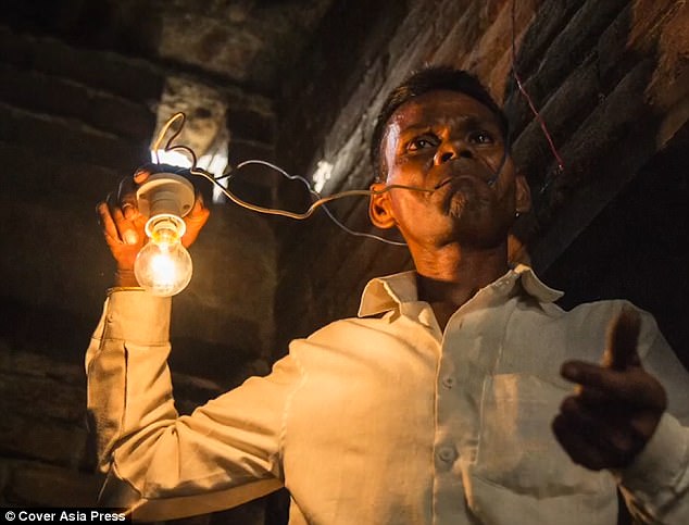 Bright spark: Naresh Kumar, 42, says he realised he could withstand high voltages and electric currents after accidentally touching a live wire