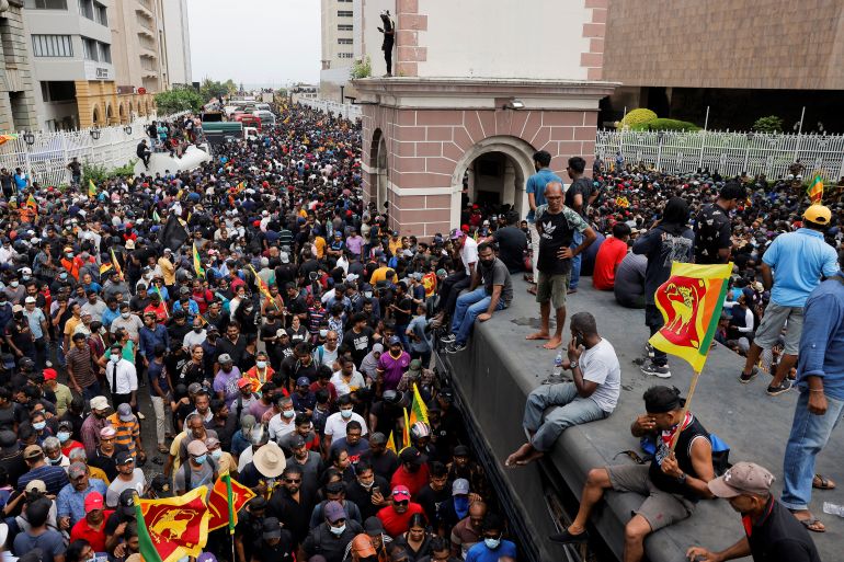 Demonstrators protest inside the President's House, after President Gotabaya Rajapaksa fled, in Colombo